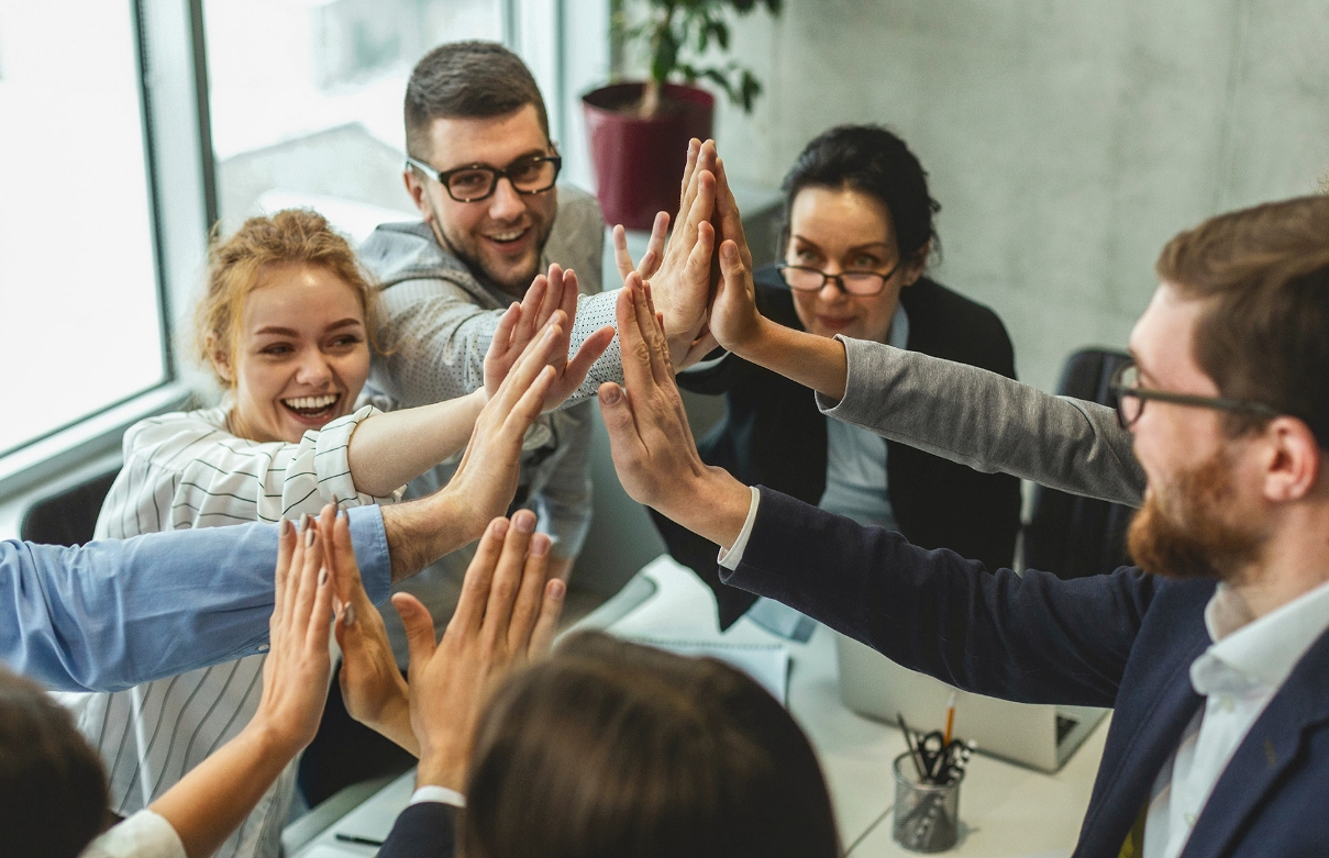 Gruppenkuscheln und  Teamdenke.
